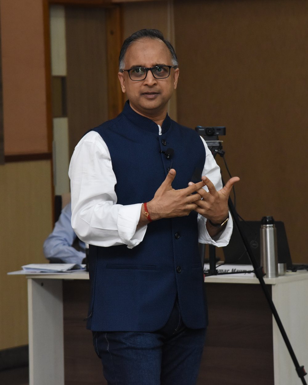 Kamlesh Jain, founder of The Attention Institute, speaking to a corporate audience